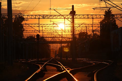 Train Rail Tracks During Sunset