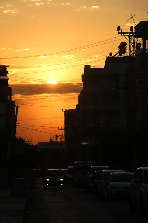 A Car Travelling on a Road during the Golden Hour