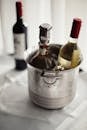Wine Bottles Cooling in Bucket