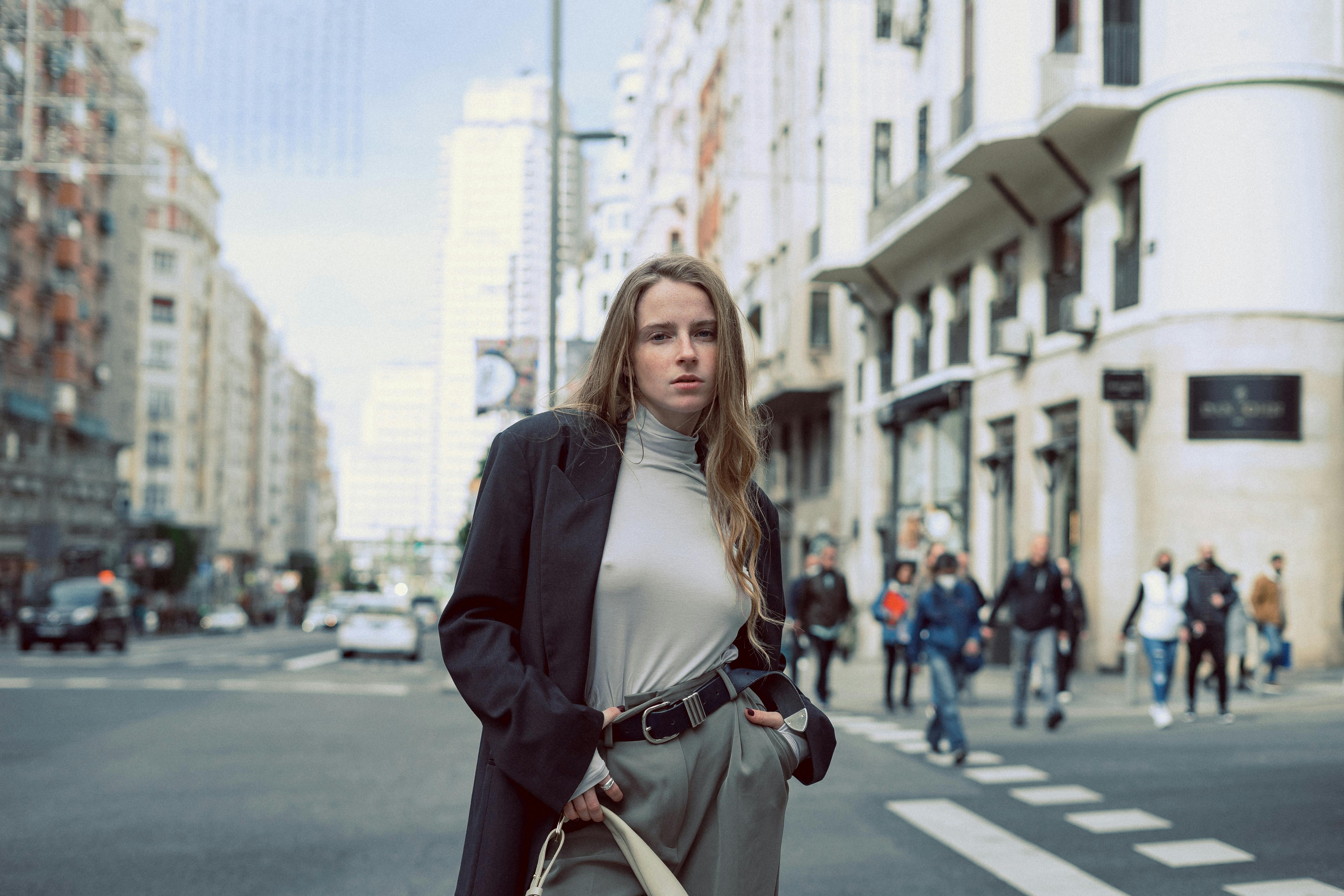 Long Coat Photo by Anna  Shevchuk from Pexels: https://www.pexels.com/photo/young-woman-standing-in-downtown-street-11566654/