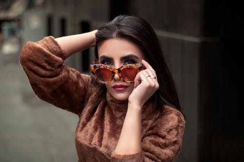 Free Woman in Brown Fur Top Wearing Brown Sunglasses Stock Photo