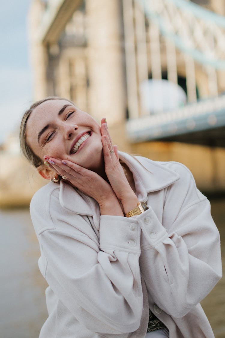 Portrait If Woman Laughing With Eyes Closed