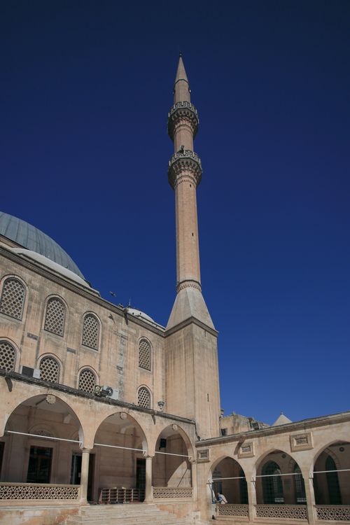 Free Beautiful view of Halilurrahman Mosque's minaret under a clear blue sky in Turkey. Stock Photo