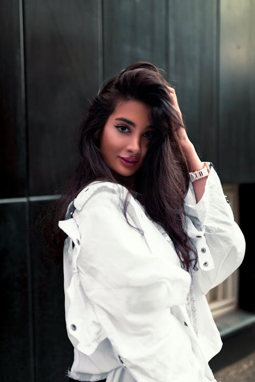Beautiful Woman in White Long Sleeves