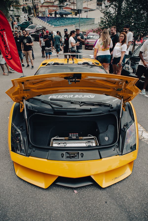 A Yellow Lamborghini Gallardo Spyder with an Open Hood
