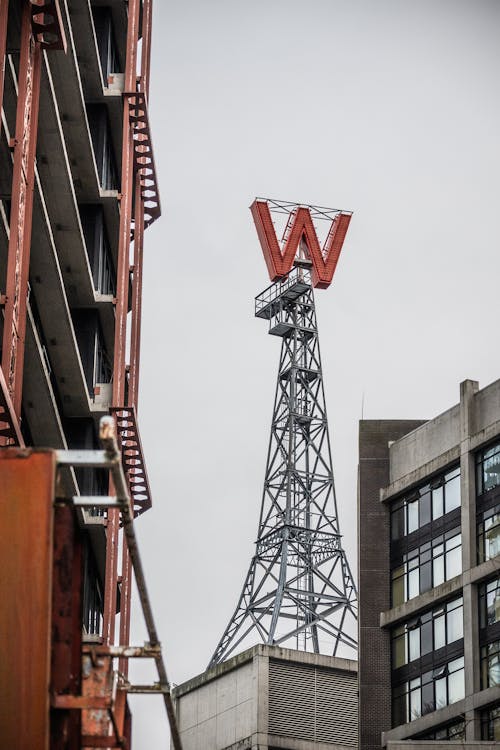 Red Metal Crane Near Building