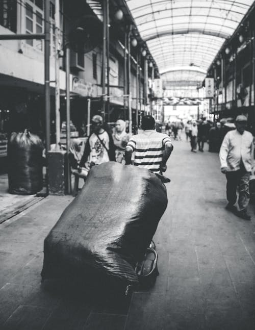 Grayscale Photo of People on the Street