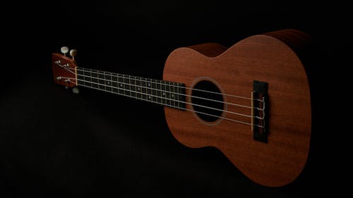 Gratis Immagine gratuita di chitarra acustica, in legno, sfondo nero Foto a disposizione