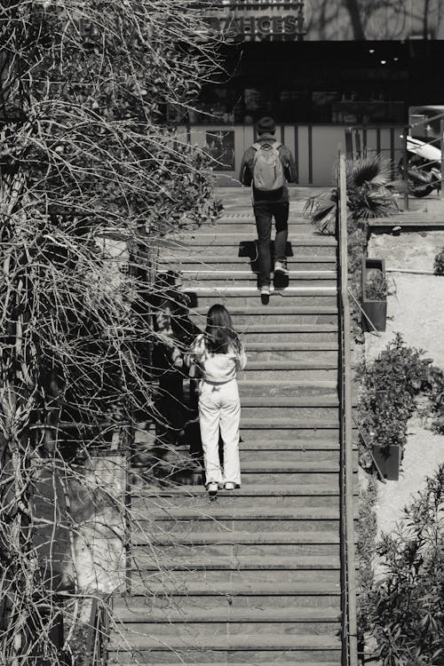 Free People Walking Up the Stairs Stock Photo