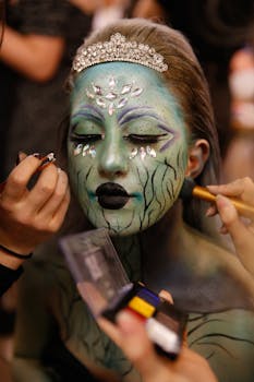 Gothic Halloween makeup session with creative face painting and jewel accents in İstanbul.