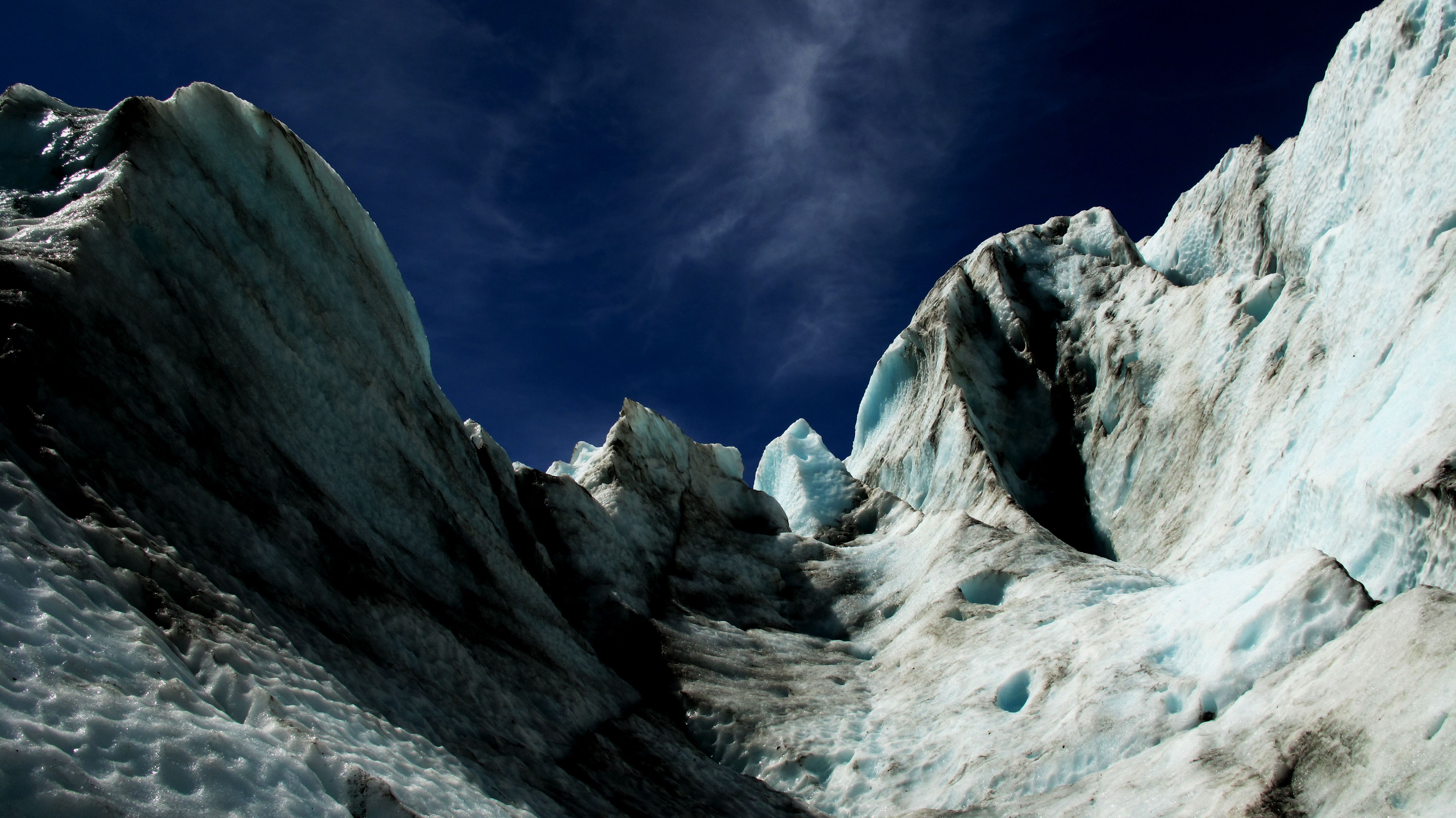 5 Day Jetski Expedition: Southeast Alaskan Adventure from Juneau - Stunning low angle shot of jagged ice formations against a vivid blue sky.