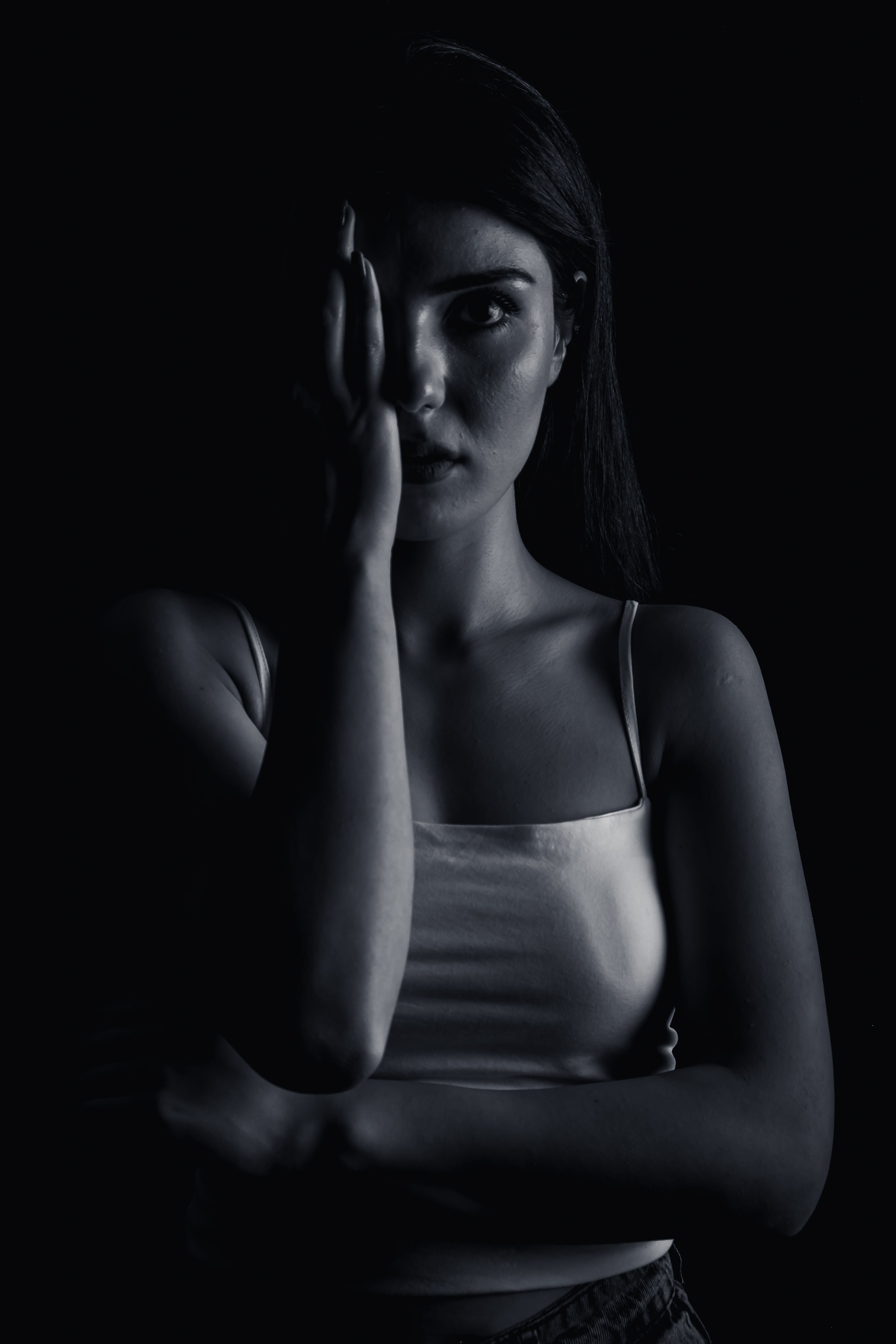 Photo of Woman in Dark Room · Free Stock Photo