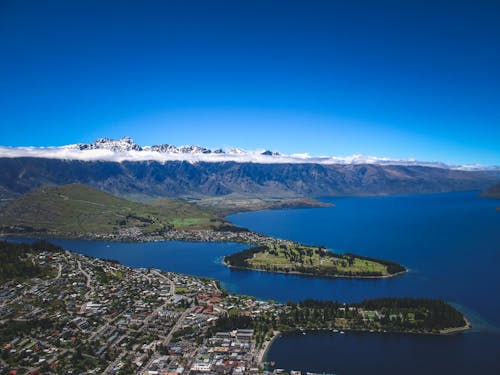 Clear Sky over Mountains and Town near Fjords