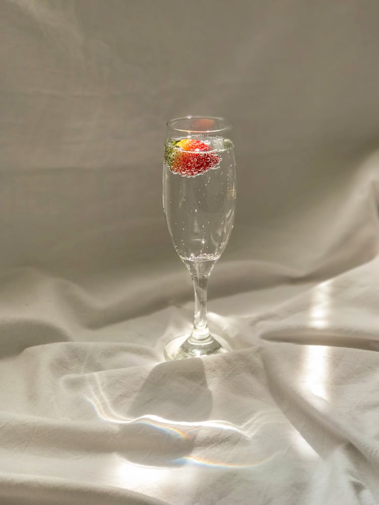 Glass Of Water With Strawberry Fruit