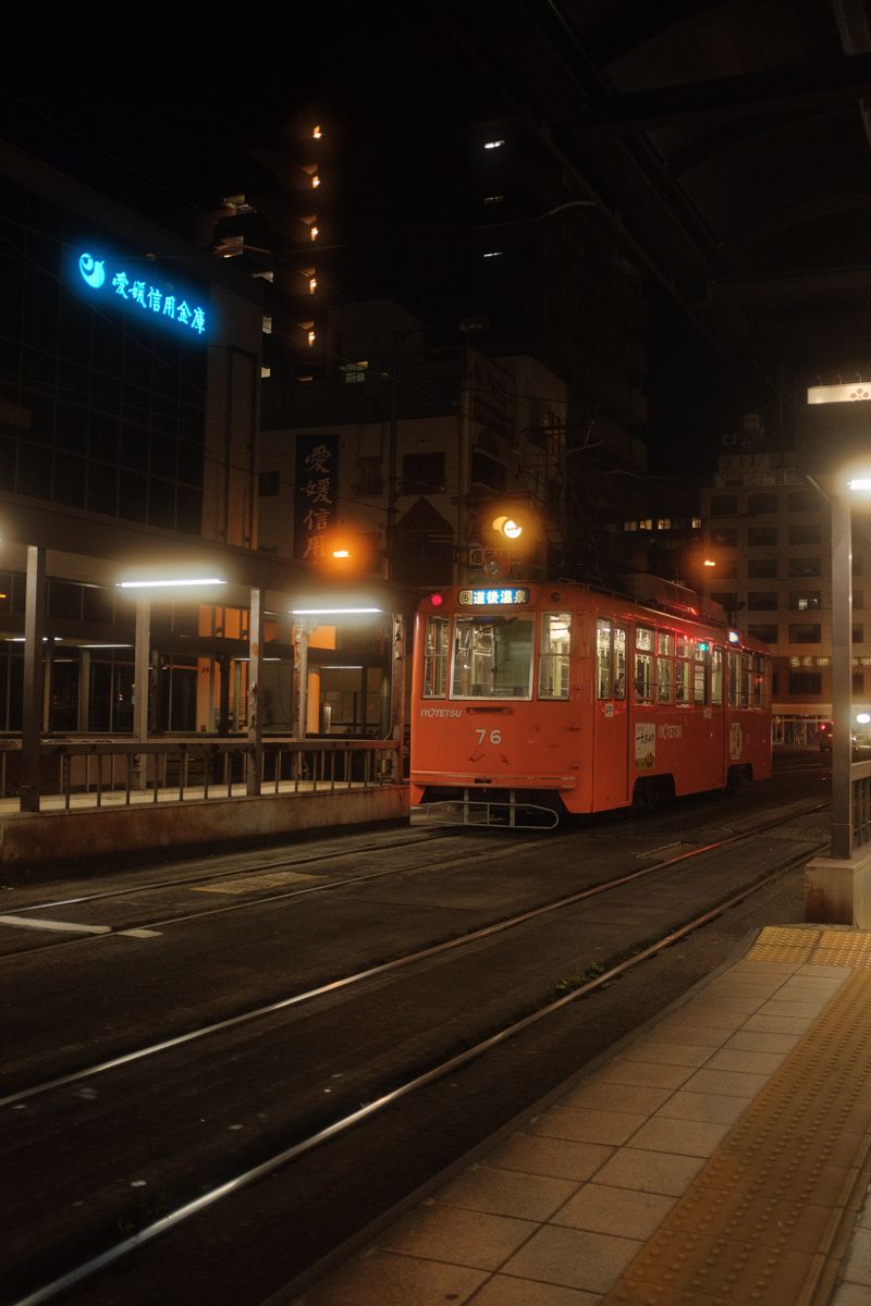 Toyama Portram tram at night on the city street