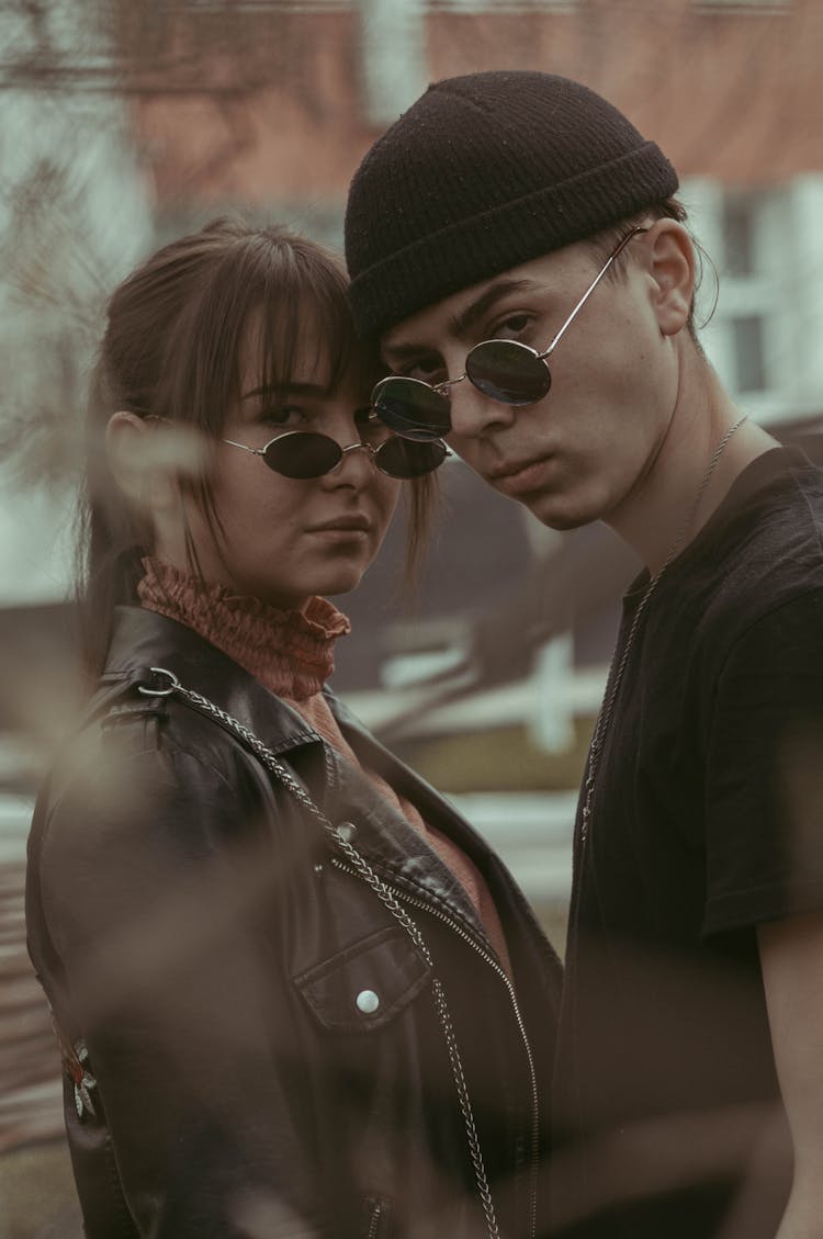 Man And Woman Wearing Sunglasses