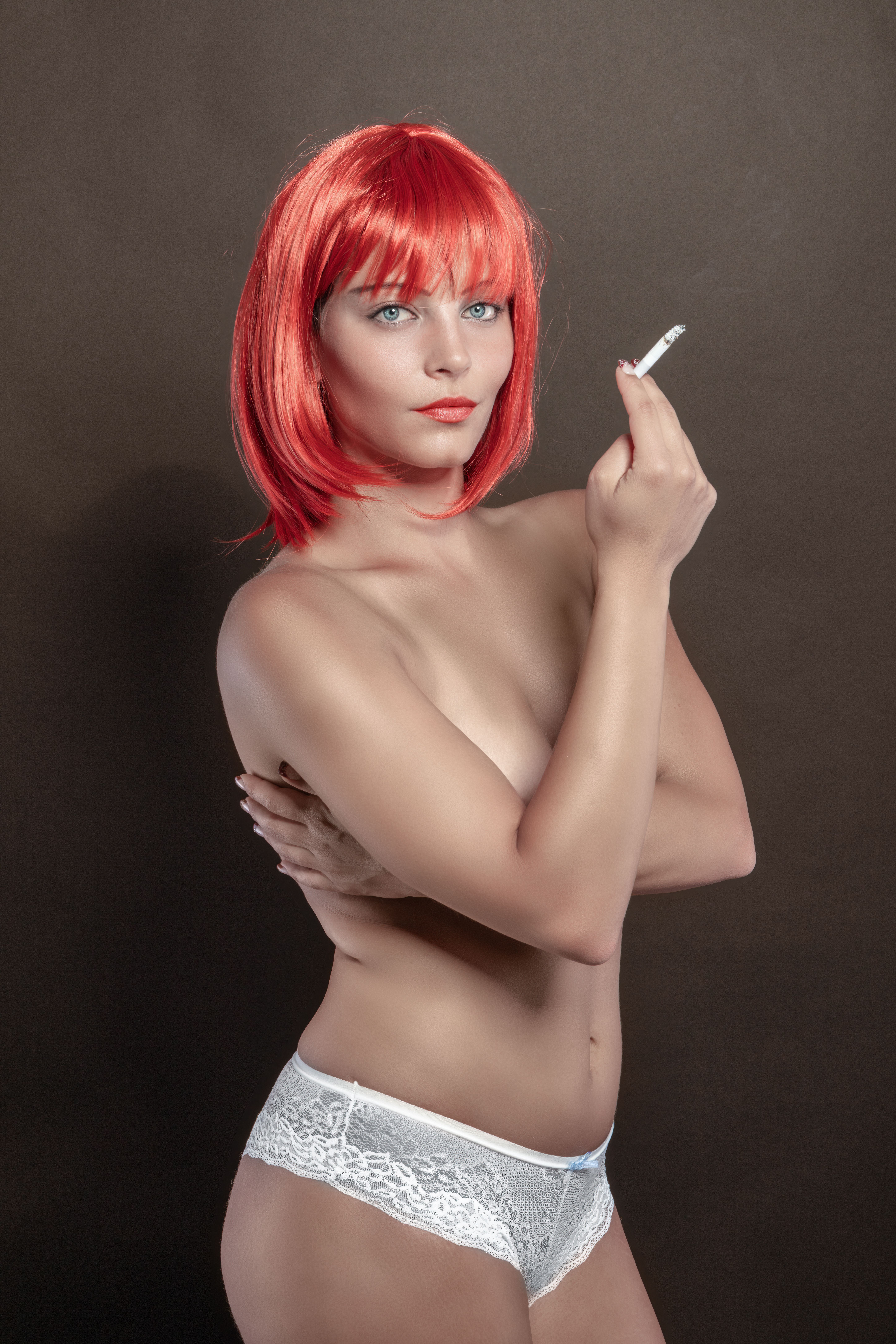 naked women smoking cigarettes Topless Woman Smoking a Cigarette · Free Stock Photo