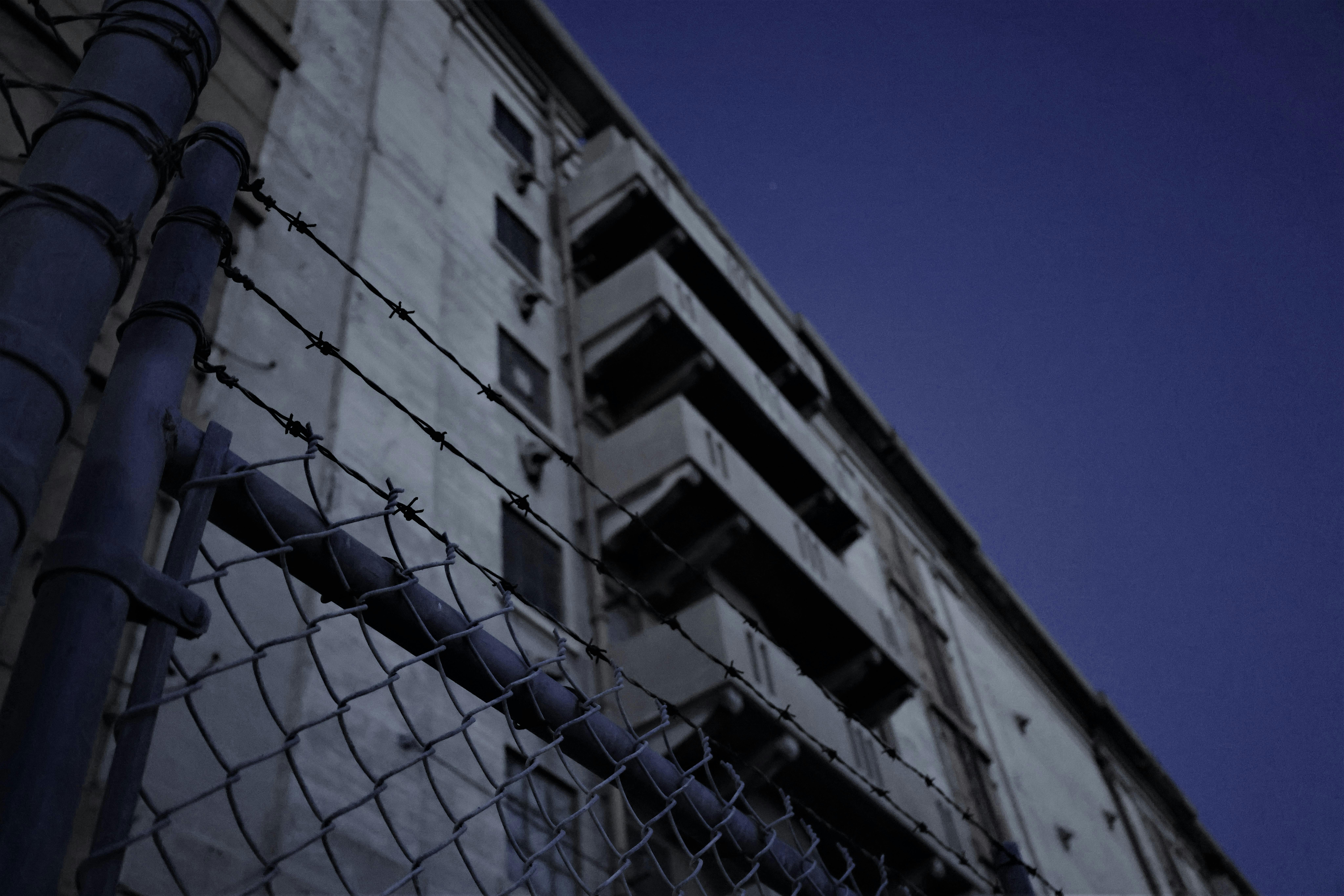 Nurse gently holding a newborn baby in a hospital setting