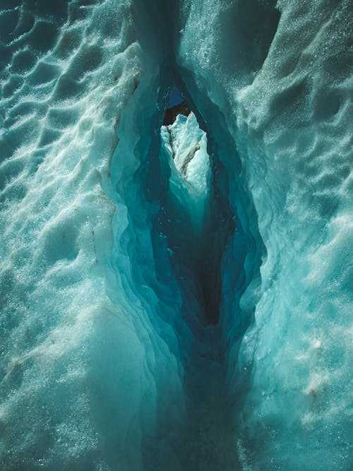 Ice Cave in Winter Landscape