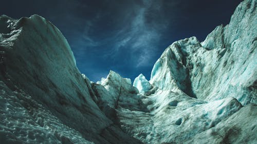 Snow Covered Mountain Under Blue Sky