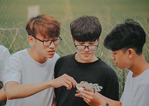 Man Wearing Black Crew-neck Shirt Beside Man Wearing White Crew-neck Shirt