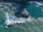 Sea Waves Crashing on Rock Formations