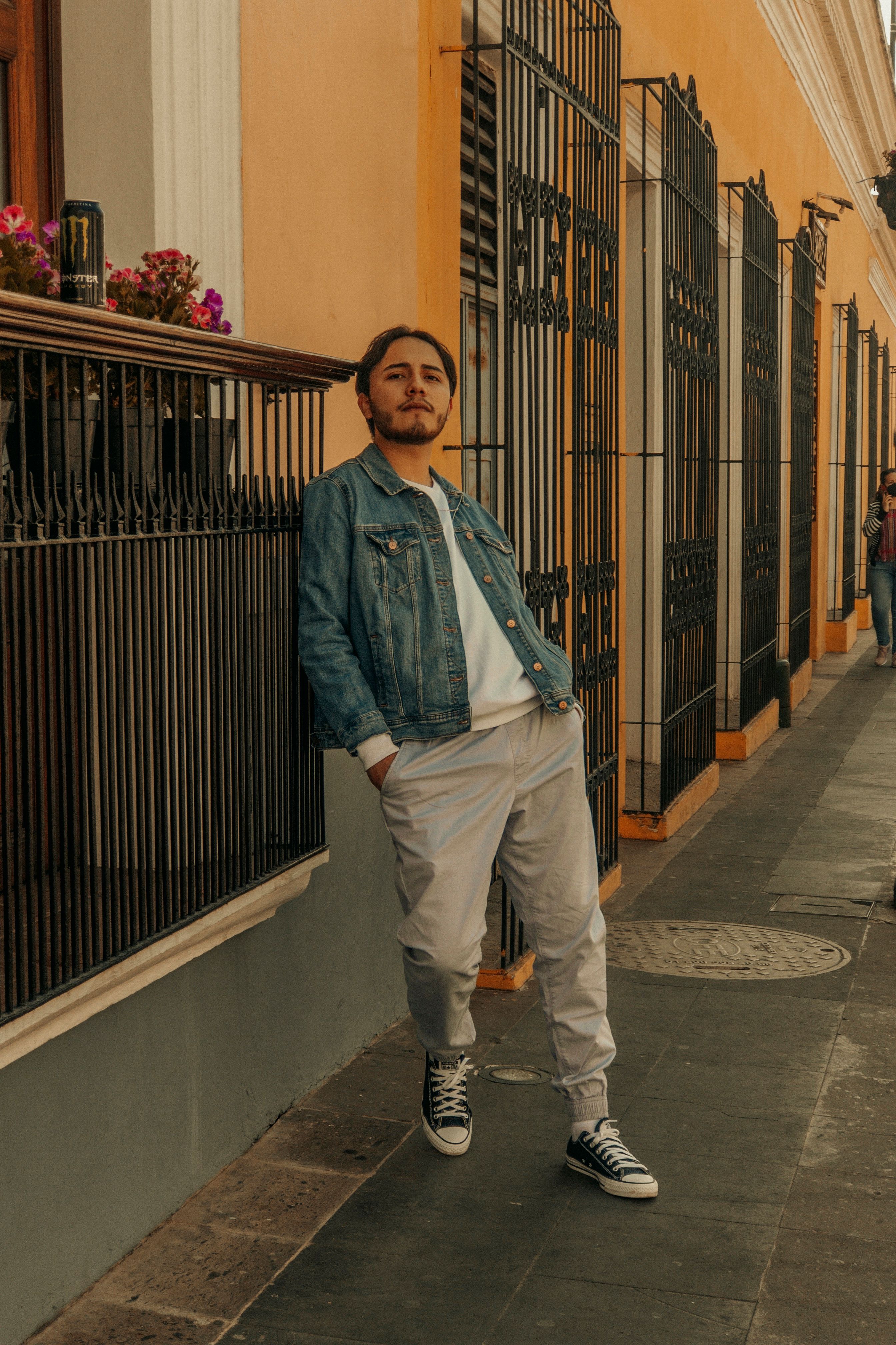 Man Wearing Denim Jacket ang Gray Joggers · Free Stock Photo