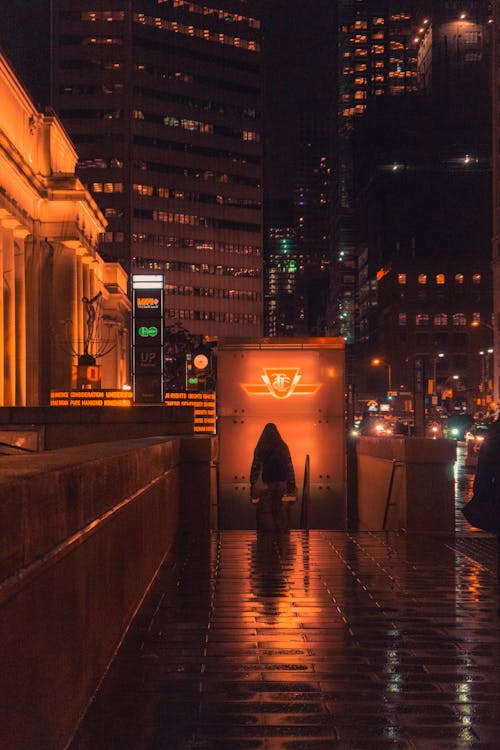 Subway Entrance and a City at Night 