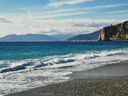 Free Explore the beautiful coastline of Finale Ligure with crashing waves and stunning cliffs. Stock Photo