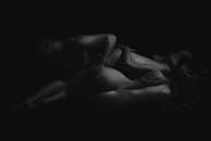 Man and Woman Nude Lying Together