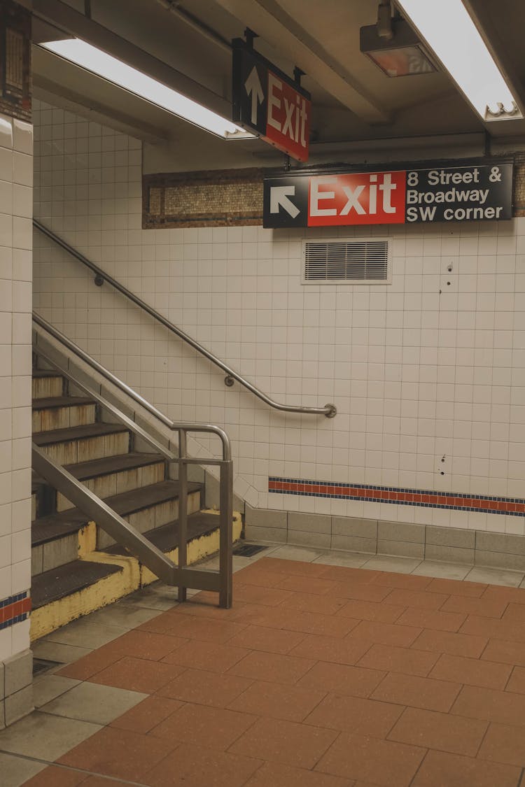 Exit Signs At A Subway