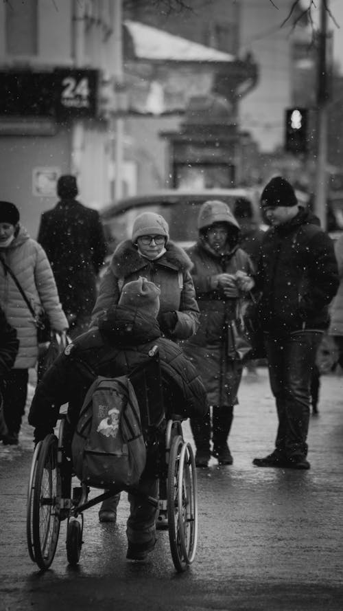 Grayscale Photo of People on the Street 
