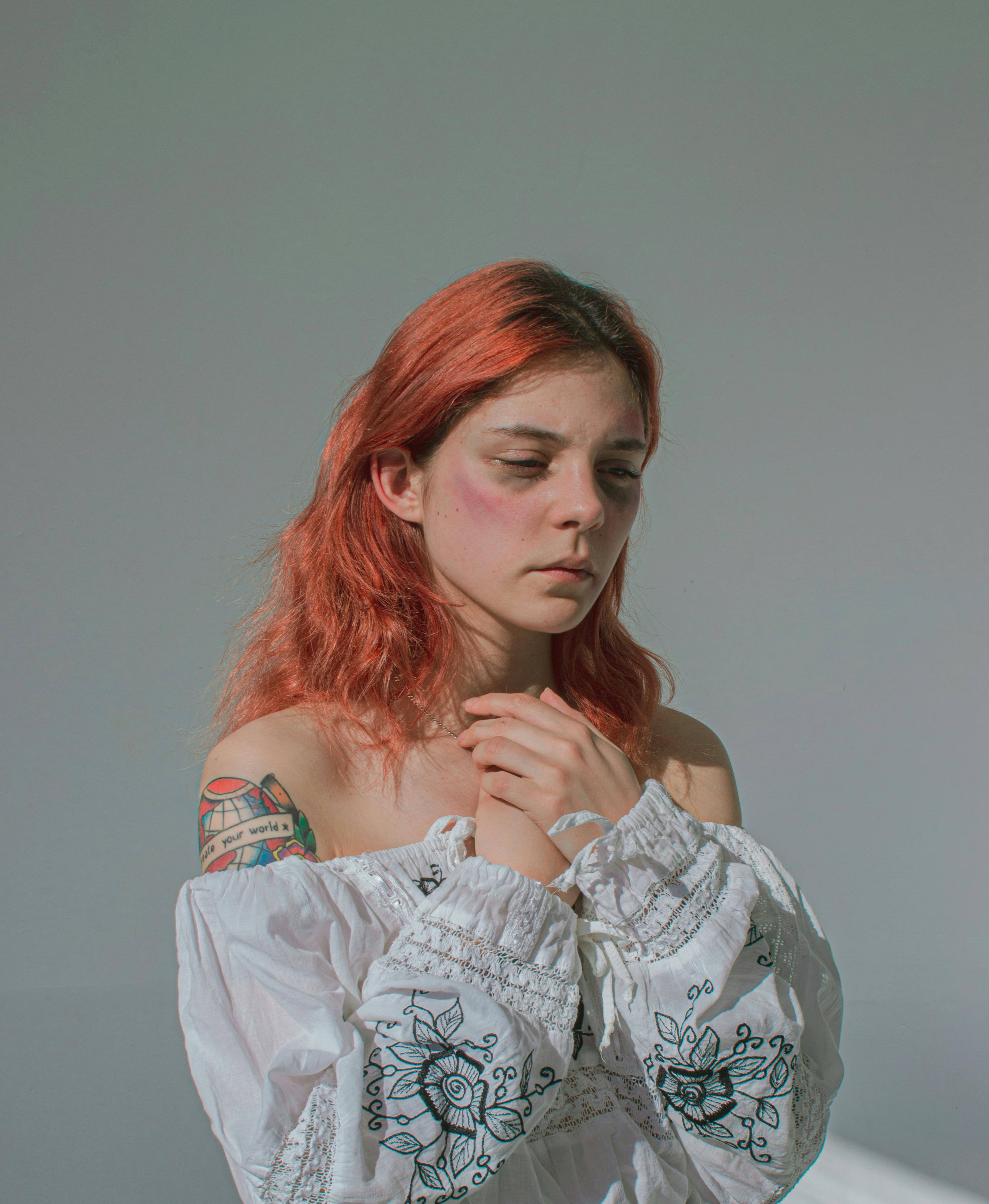 A Portrait of a Woman with a Bruise on her Face · Free Stock Photo