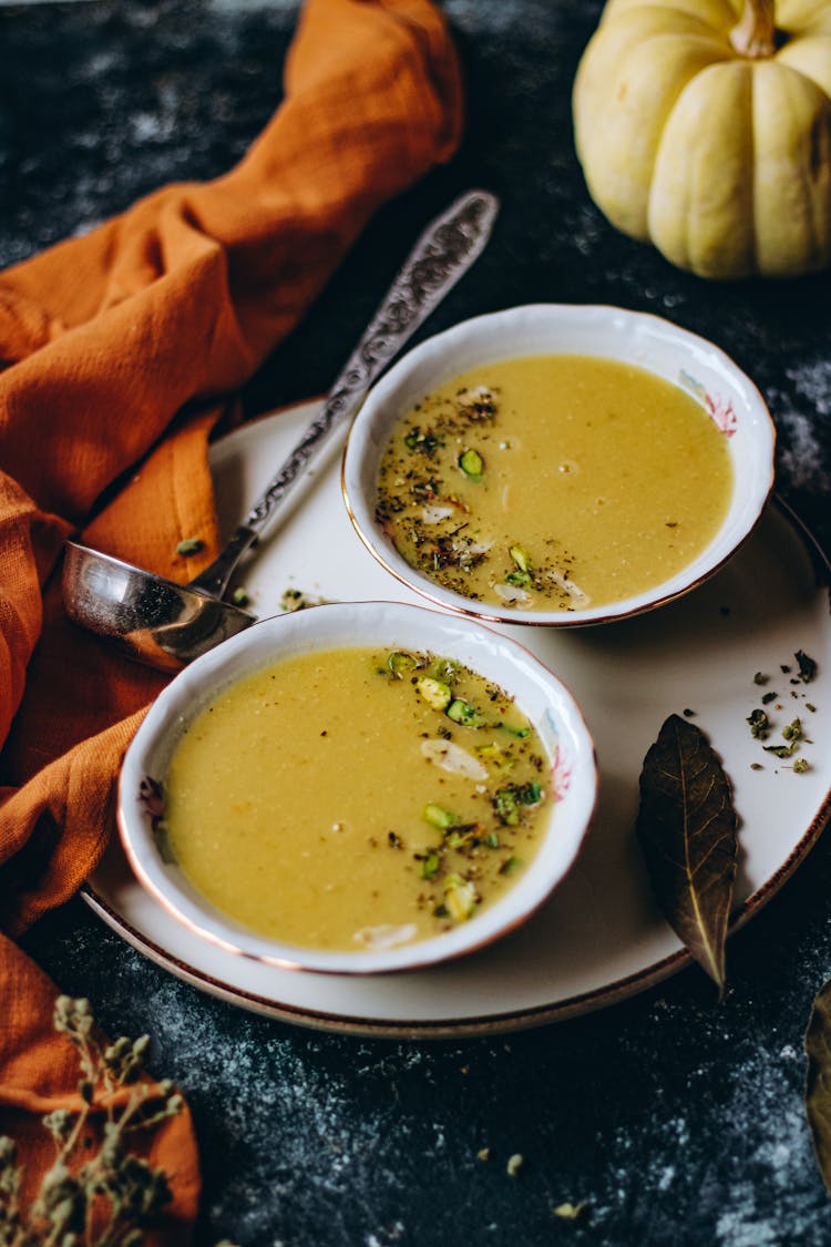 Two Bowls Of Appetizing Pumpkin Soup