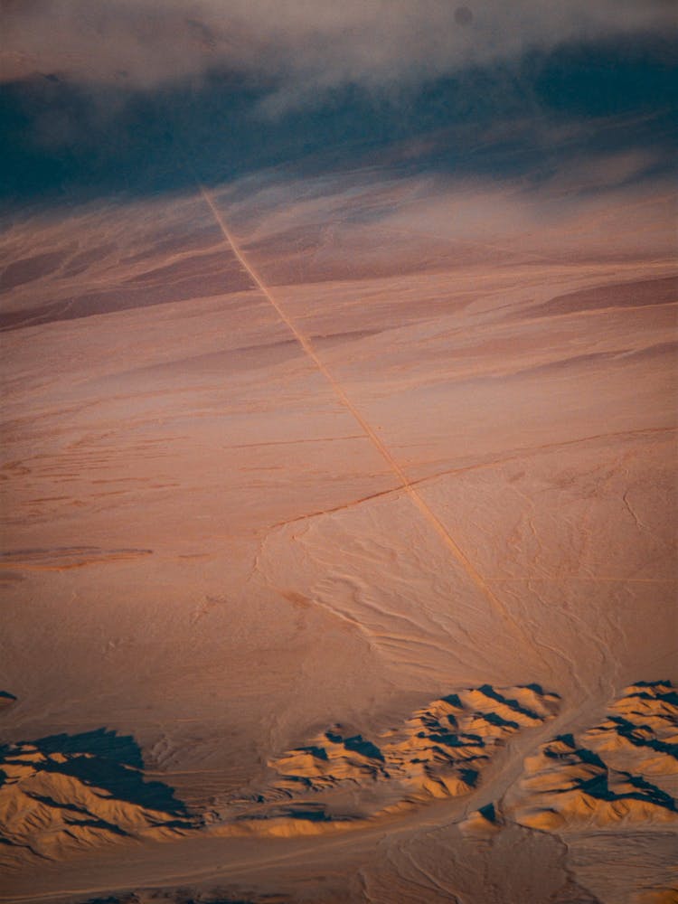 Aerial View On Desert Mountains At Sunset 