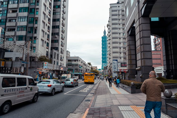 Busy Street With Cars And A Bus