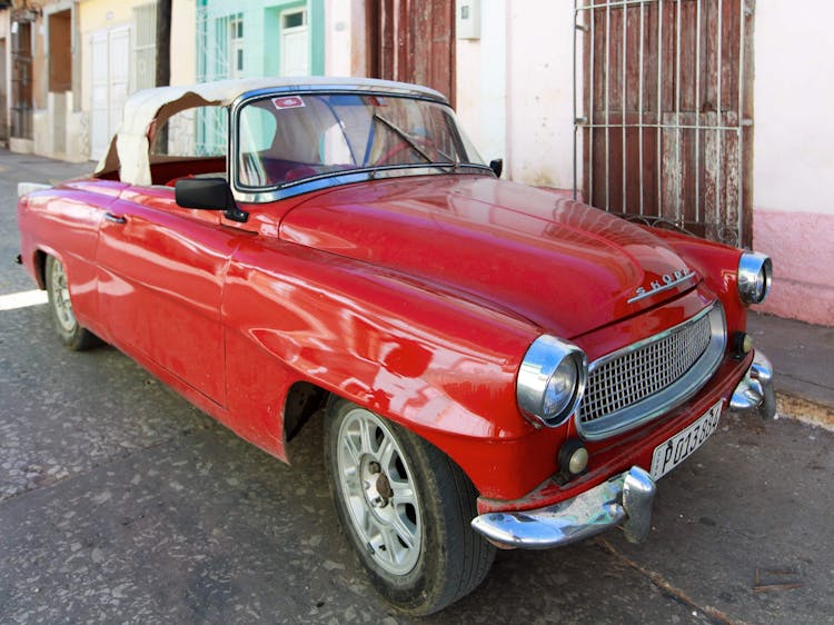 Red Classic Car Parked On The Road