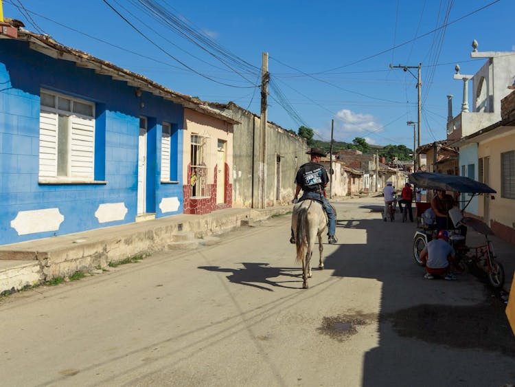 Man Riding A Horse 