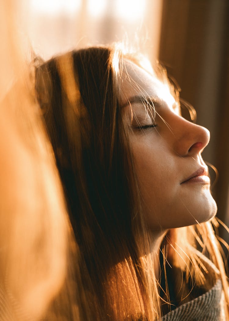 Beautiful Woman With Her Eyes Closed