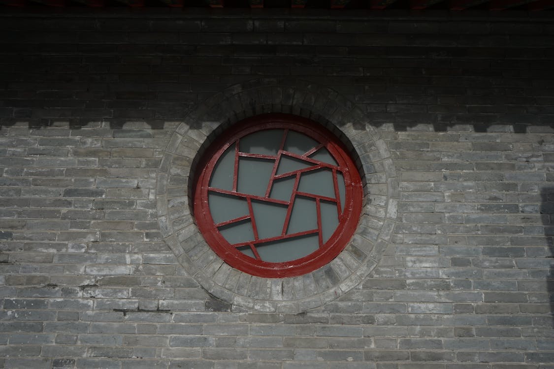 Round Window in a Brick Building