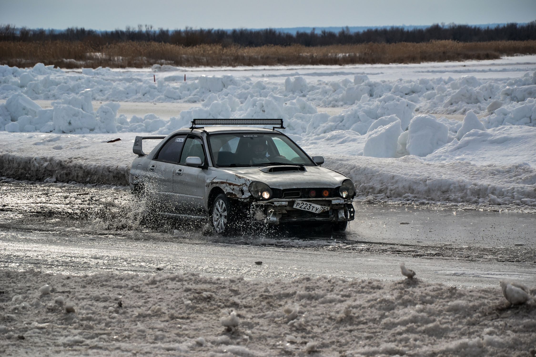 Muddy Rally Car Rear View A Rally Car on a Muddy Track · Free Stock Photo