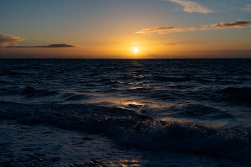 日出, 日落, 波浪撞擊 的 免费素材图片