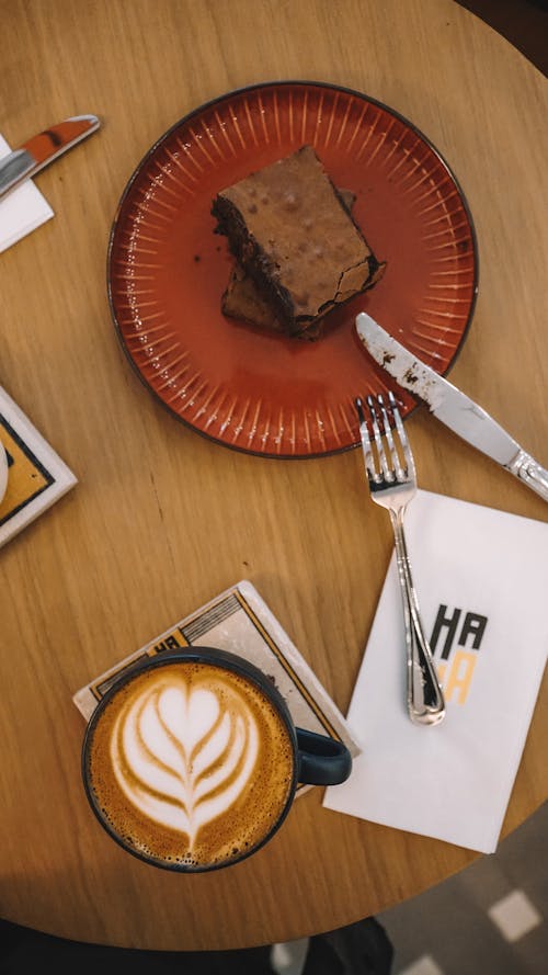 Free Hot Coffee Beside Chocolate Brownies in a Plate Stock Photo