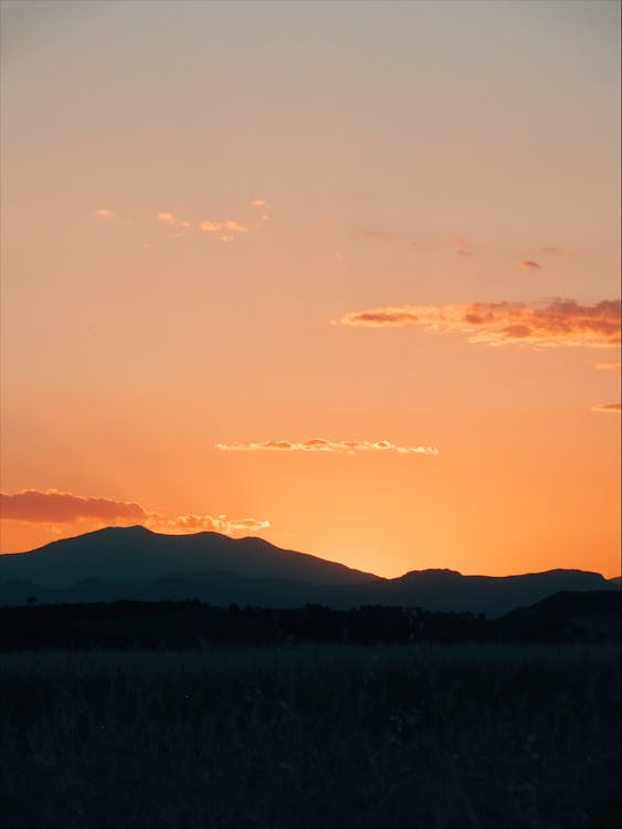 Silhouette of a Mountain during Sunset