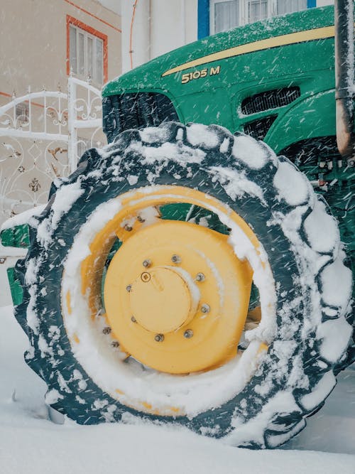 Free Tractor Covered with Snow Stock Photo