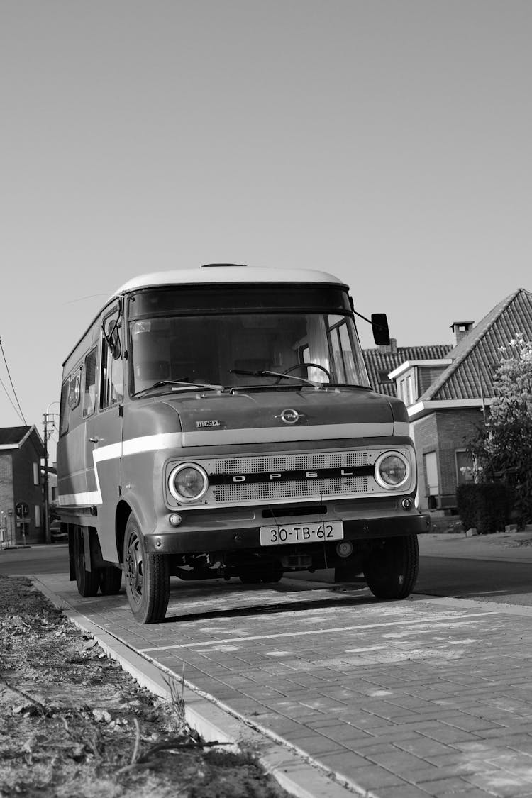 Grayscale Photo Of A Vintage Opel Van