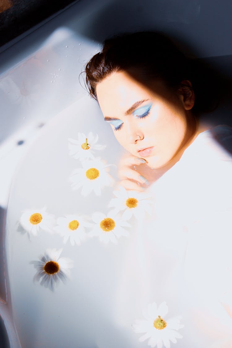 Woman In A Bathtub With Daisies