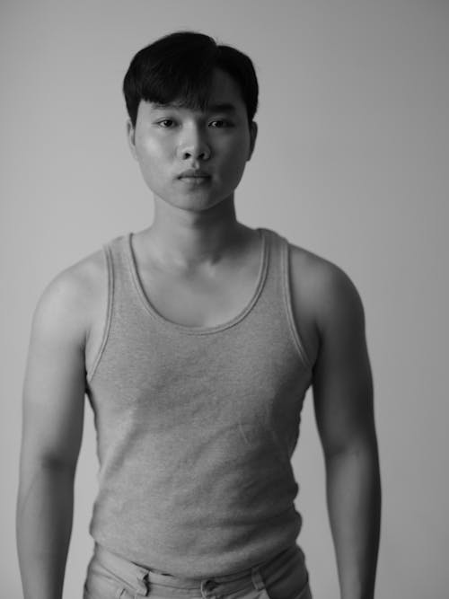 Black and White Portrait of Man Wearing Tank Top