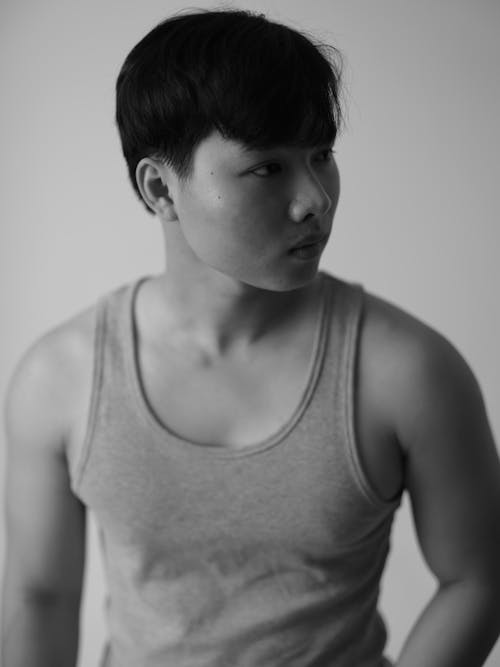 Free Black and White Portrait of Man Wearing Tank Top Stock Photo
