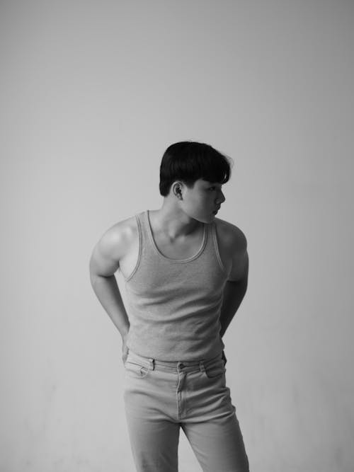 Black and White Portrait of Man Wearing Tank Top